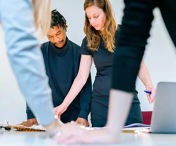 Colleagues working at a desk