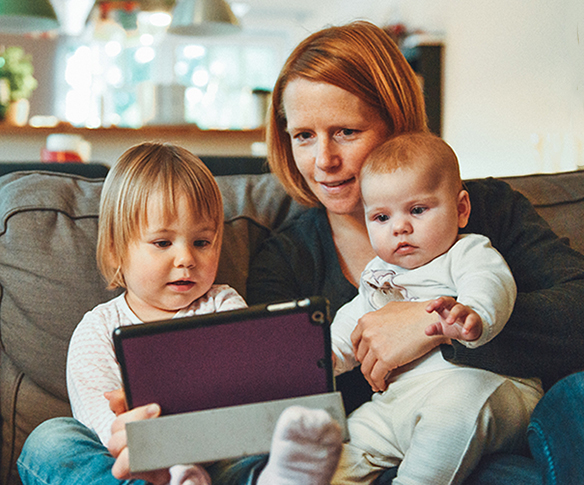 Mother and children on tablet
